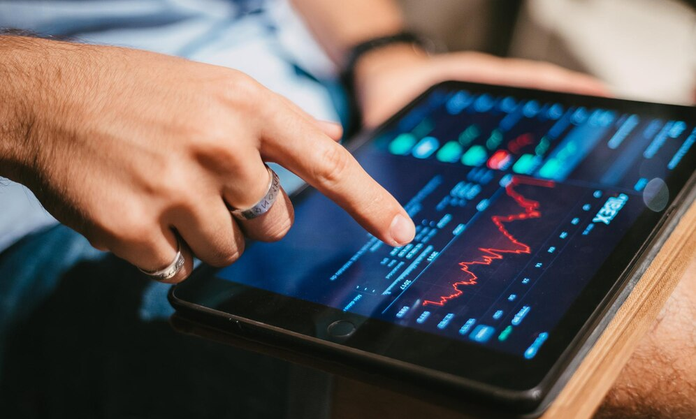 Man checking market trend on a tablet