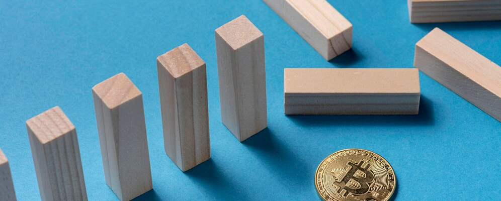 Wooden blocks and a crypto coin