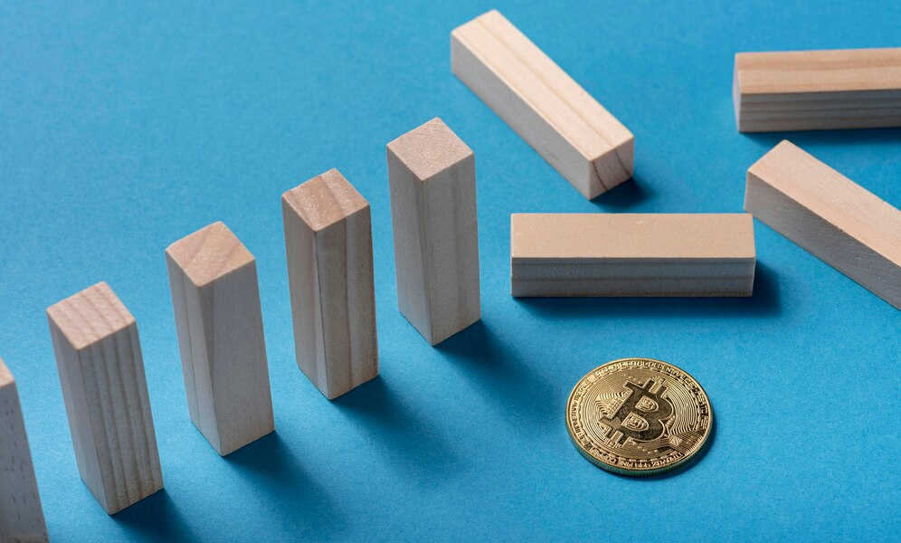 Wooden blocks and a crypto coin