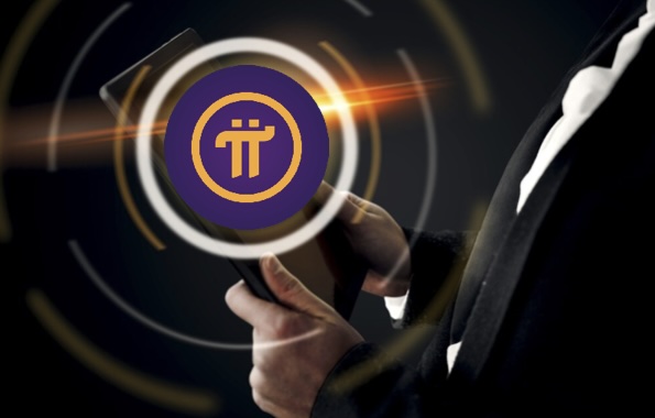 man holding a tablet showing a pi coin