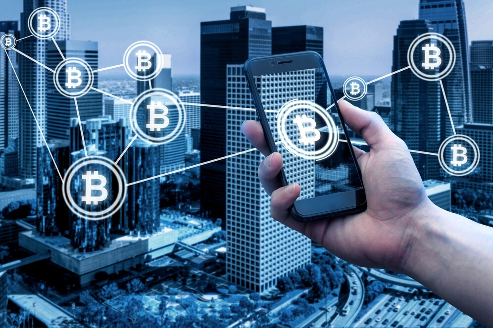 Person with phone over city skyline, connected by lines to Bitcoin icons
